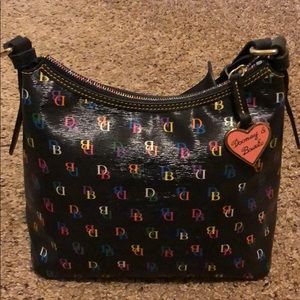 Dooney & Bourke Black bag w/ rainbow print zipper
